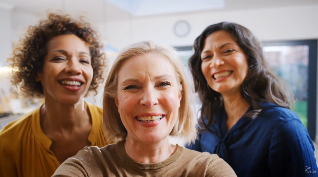 Three ladies smiling for a selfie photo