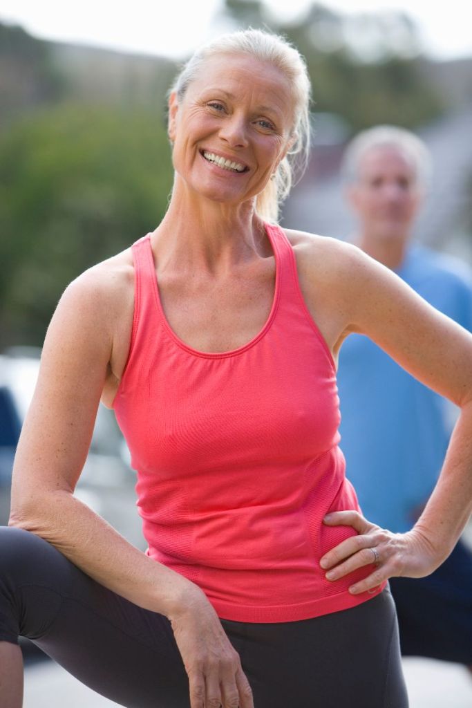 Fit senior woman after workout Woman in workout clothing smiling and relaxed