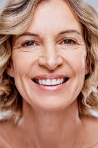 Shot of a beautiful mature woman posing against a white background.