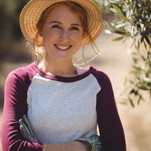 portrait-of-smiling-young-woman-with-arms-crossed-2025-10-28-21-50-44-utcbf