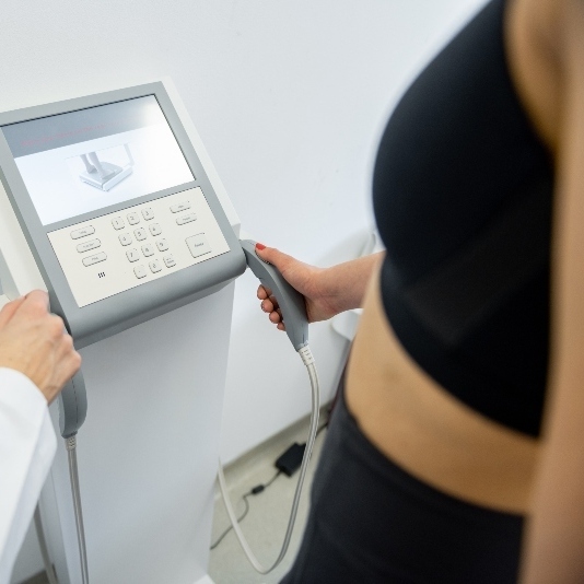 a-woman-undergoes-a-body-composition-analysis-with-2026-01-11-10-55-22-utcbfbf